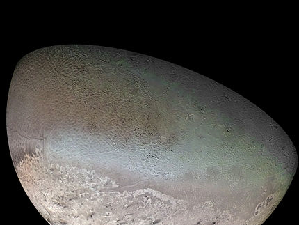 Triton: Voyager 2 photomosaic of Triton's sub-Neptunian hemisphere[caption 1]