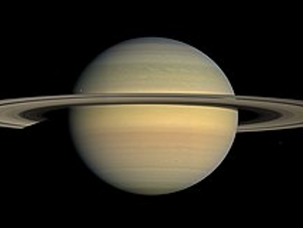 Saturn: Pictured in natural color approaching equinox, photographed by Cassini in July 2008.