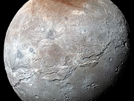 Charon in enhanced color to bring out differences in surface composition.